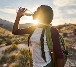 Hiker drinking water